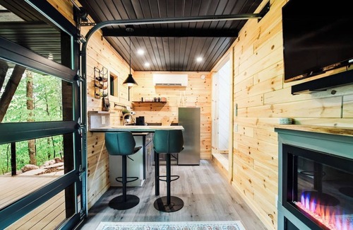 Charlevoix House | The Treehouse escape is set amidst 55 acres of natural beauty