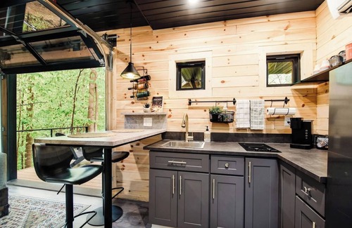 Charlevoix House | The Treehouse escape is set amidst 55 acres of natural beauty