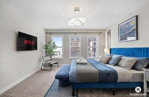 Southeast Calgary House | The Ultimate Estate Featuring - Karaoke, Air Hockey, Pool Table, Patio, BBQ Space, King Bed, Board Games, Library & More!