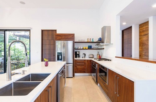 Tamarindo House | The ultimate Family retreat. Daily housekeeping, beach club membership and outdoor grill by the pool