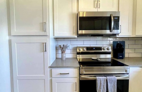 Papillion House | The White Pine Modern, Spacious with garage