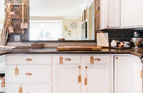East Shoreham House | The Whitewashed Home with Movie Theatre & Outdoor Oasis