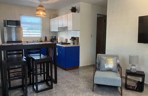 Gobernador Pinero Apartment | The Yellow Door Casita A/C, Parking, Private Balcony & more