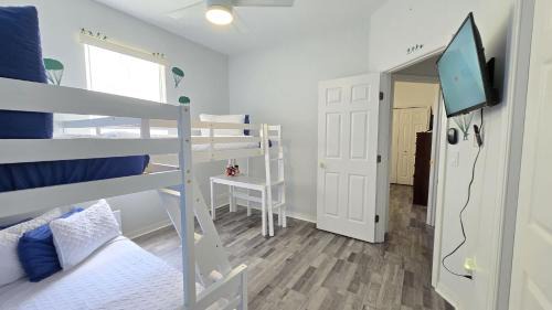 Haines City House | Themed kid bedrooms, 17 miles to Disney and Legoland, private pool, kitchen, wifi, washer, dryer