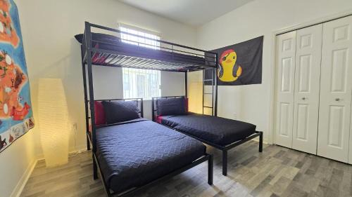 Haines City House | Themed kid bedrooms, 17 miles to Disney and Legoland, private pool, kitchen, wifi, washer, dryer