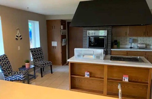 Marshland Apartment | This AMAZING river getaway is PERFECT for YOU! Private deck, grill & fire pit!