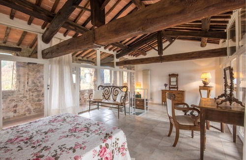Stigliano Apartment | This apartment is located in a historic tower in the Castello del Poggiarello, a beautiful and chara