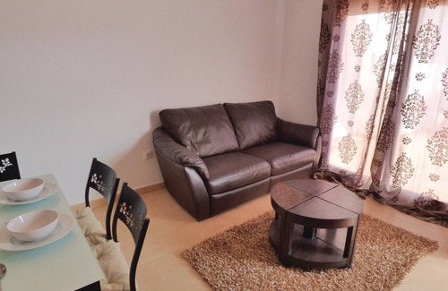 Alhama de Murcia Apartment | This beautiful apartment is located in a quiet corner of a resort complex with a communal pool and o