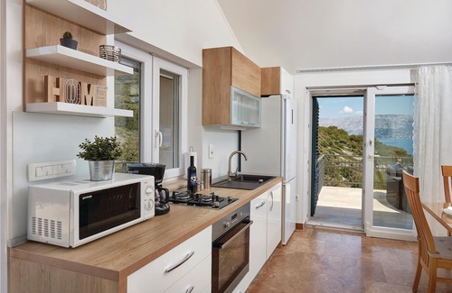 Povlja House | This beautiful domicile with pool is located in a beautiful bay, surrounded by olive and pine trees,