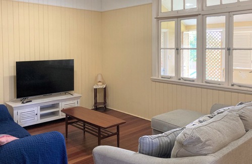 Tin Can Bay House | This comfy cottage is centrally located and waking distance to the Marina