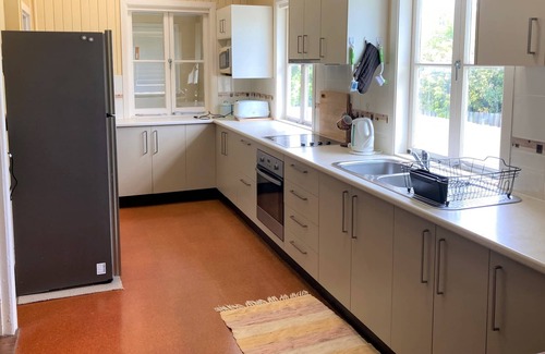 Tin Can Bay House | This comfy cottage is centrally located and waking distance to the Marina