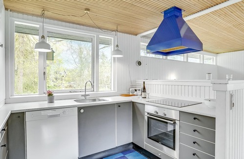 Stubbekobing House | This cozy cottage is located in Sortsø Strand, near Stubbekøbing.