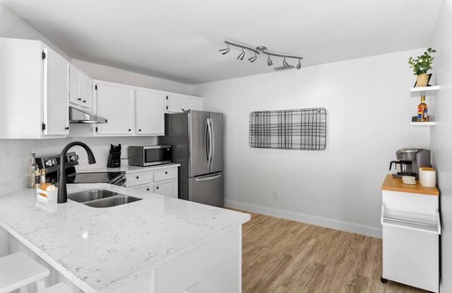 Brandon House | This home has 3 bedrooms with 6 beds and 2 bathrooms making it perfect for 9 guests!
