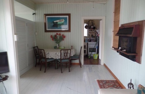 Opononi House | This is the one, pristine kiwi bach by the water!