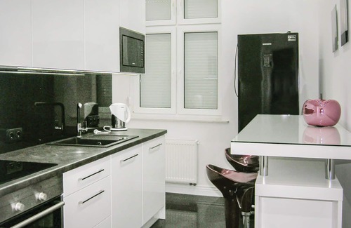 Gizycko Apartment | This large, modern vacation apartment is located in a renovated residential building.