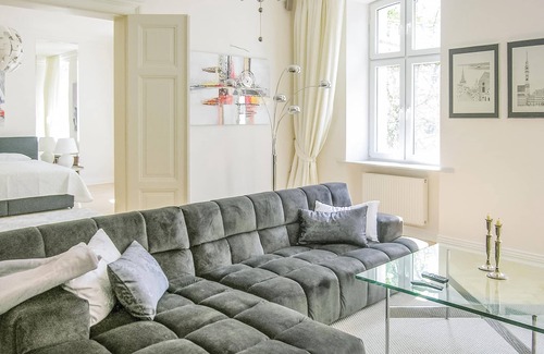 Gizycko Apartment | This large, modern vacation apartment is located in a renovated residential building.