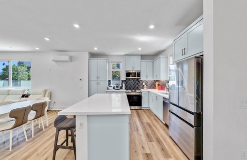 Irvine House | this newly built, fully furnished tri-level home awaits your arrival.nn