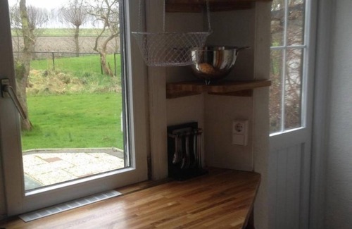 Hoofdplaat House | This nostalgic dijk cottage is Number One, a village 3 km behind Breskens. The semi-detached cottage is built against an old seawall and suitable for max. 4 people.