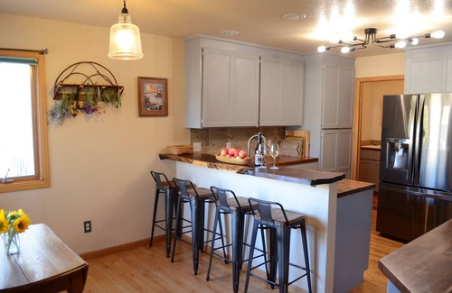 Laramie House | This spacious single home combines modern amenities with a cozy mountain feel