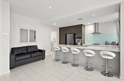 Sapphire Beach House | This stunning home with modern amenities is just a short walk to the beach