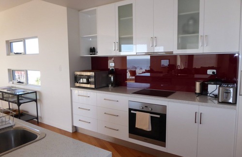 Bridport House | This stunning, split level town house is in the box seat at Bridport with...