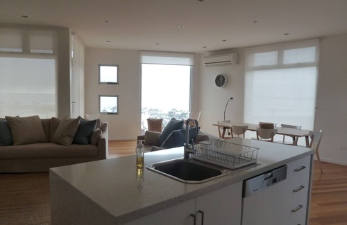 Bridport House | This stunning, split level town house is in the box seat at Bridport with...