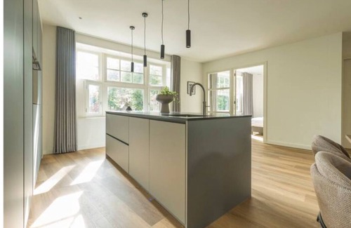 Oirschot Apartment | This unique Oirschot apartment offers stylish comfort with a spacious bedroom and modern amenities