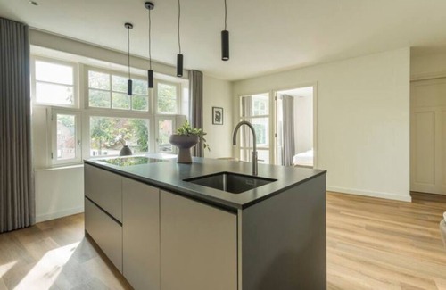 Oirschot Apartment | This unique Oirschot apartment offers stylish comfort with a spacious bedroom and modern amenities