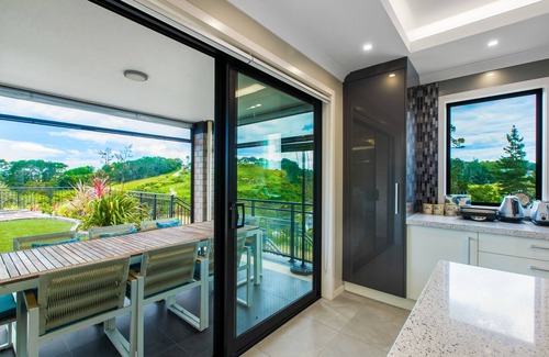 Auckland House | Three levels and home with covered swimming pool,tennis court,gym and games room
