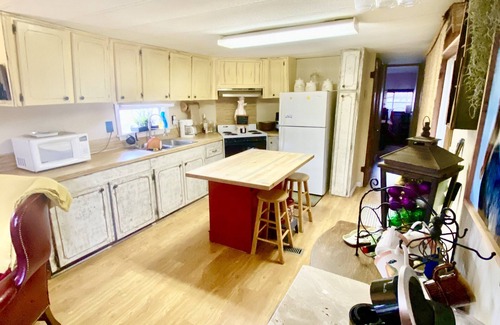 Lottie House | Three Mile Lake -WATERFRONT and completely Furnished lake house .