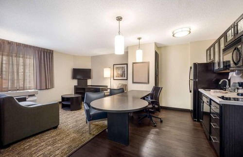 Schiller Park Hotel | THREE Relaxing 1BR Suites with Full Kitchen, Free Airport Shuttle, Pet-friendly!