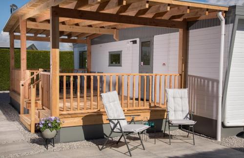 Ouddorp Ski Chalet | ThuizInOuddorp Parel no 30 & Oester no 29 Verkoeling aan Zee