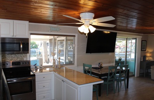 Weeki Wachee Gardens House | Tiki Tropical Retreat - directly on the clear Weeki Wachee River (not a canal)