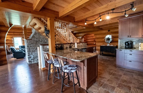 Alban Cottage | Timber Frame Log Cottage, across from the French River, great for big families