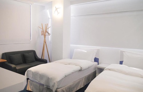 West District Hotel | Time Flyer Hotel
