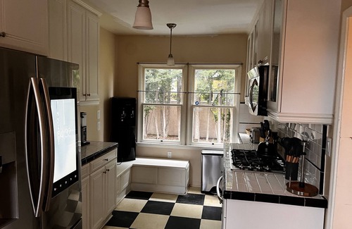 Southwest Anaheim House | Timeless Charm: 100-Year Olde Spanish Style Home, in Anaheim.