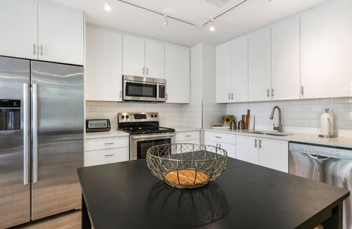 Central Business District Hotel | Timeless Elegance: 4BR Luxury Condo in New Orleans