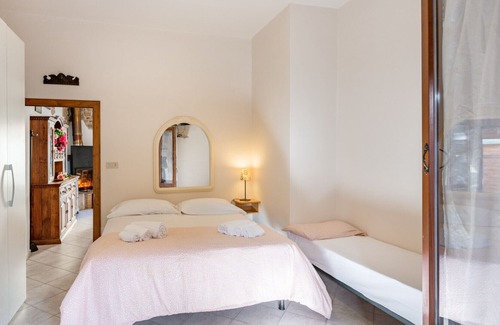 Cascina Apartment | Tiny Green Home with Jacuzzi, Parking and Barbecue