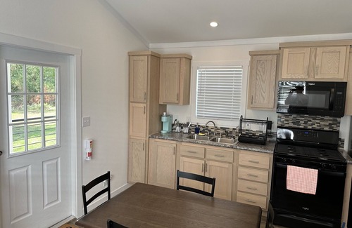 New Caney Cottage | Tiny Home Big Amenities: pool/hot tub, laundry, camp store, near Houston