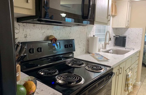 Key Largo Cottage | Tiny home in Key Largo with Private Dock, Tiki Hut and Boat Lift