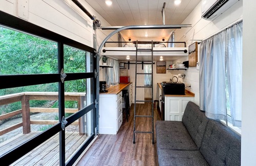 Montrose House | Tiny home located beside a creek.