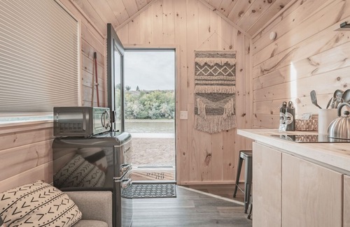 Grand Junction House | Tiny home with one queen bed on main floor.