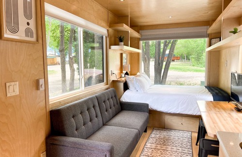 Montrose House | Tiny home with one lofted queen bed and full size futon.
