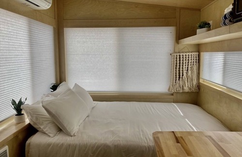 Montrose House | Tiny home with one queen bed.