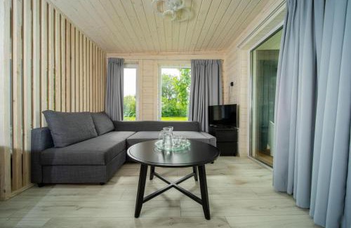 Wommels House | Tiny house aan het water op de appelhof