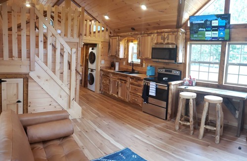 Negreet Cabin | Tiny Toledo - Lakefront Cabin with Boathouse, Fishing Pier, and DRAMATIC Sunsets