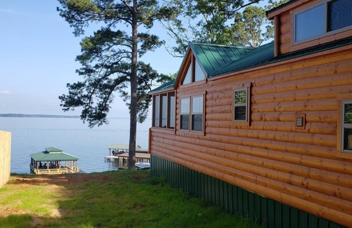 Negreet Cabin | Tiny Toledo - Lakefront Cabin with Boathouse, Fishing Pier, and DRAMATIC Sunsets