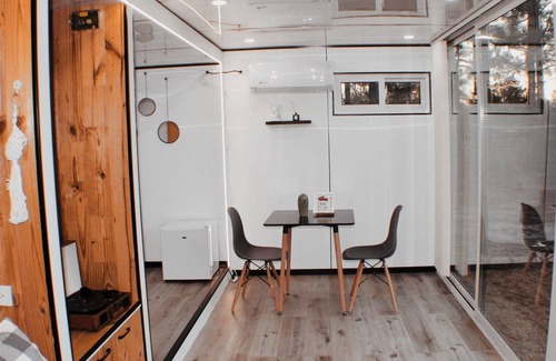 Athens Cabin | Tiny White Box on Off-grid Land. Queen size bed