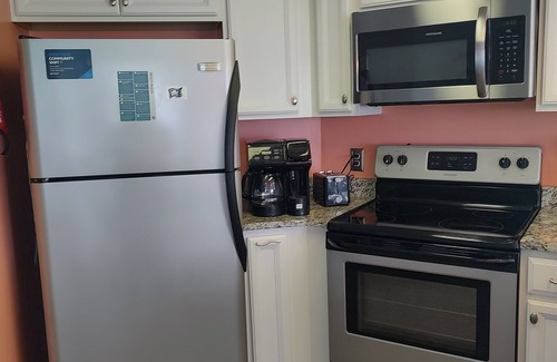 McCutcheon Field Condo | Top floor condo in N. Topsail Beach. Views of the beach & Intracoastal Waterway!