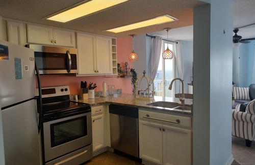 McCutcheon Field Condo | Top floor condo in N. Topsail Beach. Views of the beach & Intracoastal Waterway!